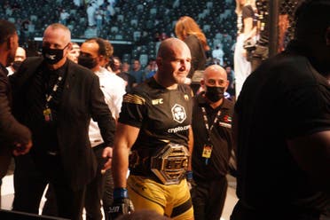 Glover Teixeira leaves the octagon after winning the light heavyweight championship in a bout against Jan Blachowicz at UFC 267 in Abu Dhabi. (Al Arabiya English)