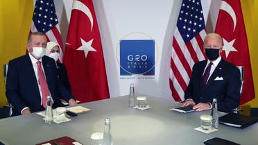 This handout photograph taken and released on October 31, 2021, by the Turkish Presidential Press Service shows Turkey's President Recep Tayyip Erdogan (L back), Turkish Foreign Minister, Mevlut Cavusoglu (L), US President Joe Biden (R back) and US Secretary of State Antony Blinken (R) attending a meeting during the G20 Summit at the Roma Convention Center La Nuvola. (Photo by Murat CETIN MUHURDAR / TURKISH PRESIDENTIAL PRESS SERVICE / AFP) / RESTRICTED TO EDITORIAL USE - MANDATORY CREDIT AFP PHOTO/MURAT CETIN MUHURDAR / TURKISH PRESIDENTIAL PRESS SERVICE  - NO MARKETING - NO ADVERTISING CAMPAIGNS - DISTRIBUTED AS A SERVICE TO CLIENTS - RESTRICTED TO EDITORIAL USE - MANDATORY CREDIT AFP PHOTO/MURAT CETIN MUHURDAR / TURKISH PRESIDENTIAL PRESS SERVICE  - NO MARKETING - NO ADVERTISING CAMPAIGNS - DISTRIBUTED AS A SERVICE TO CLIENTS