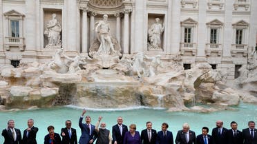Leaders of the G20 pose in front of the Trevi Fountain during an event for the G20 summit in Rome, Sunday, Oct. 31, 2021. (AP)