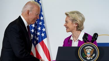 US President Joe Biden and European Commission’s President Ursula von der Leyen shake hands after speaking about steel and aluminium tariffs, on the sidelines of the G20 leaders' summit in Rome, Italy, on October 31, 2021. (Reuters)