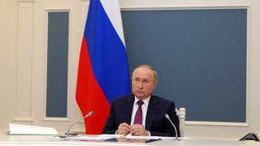 Russian President Vladimir Putin attends a session of the G20 Leaders' Summit taking place in Rome, via teleconference in Moscow, on October 30, 2021. (AFP)