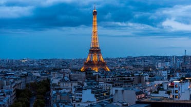 Eiffel Tower against the sun stock photo