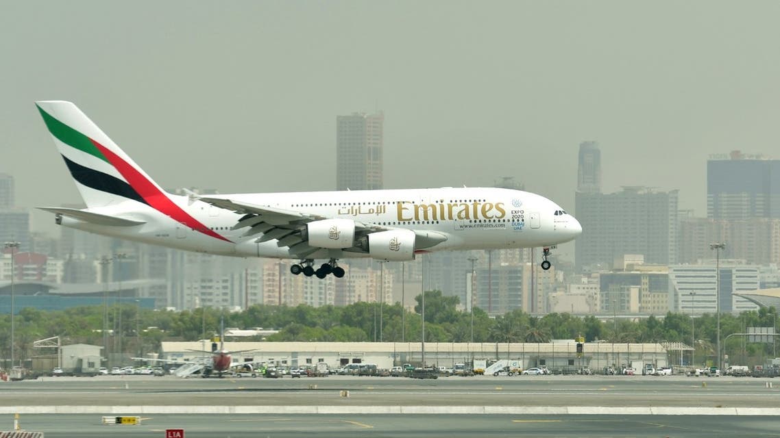A picture take on September 14, 2017 shows an Airbus A380 of Emirates landing at the tarmac at Dubai's International Airport. (AFP)