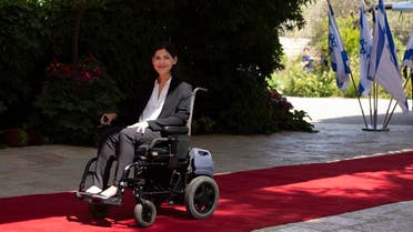Israel Energy Minister Karine Elharrar arrived on Nov. 2, 2021, to the global climate summit in Scotland, a day after police prevented her wheelchair accessible vehicle from reaching the conference’s venue. (AP)