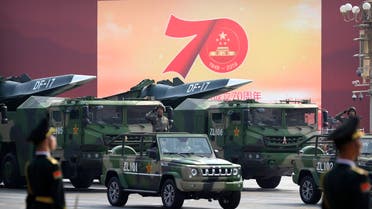 Military vehicles carrying DF-17 ballistic missiles roll during a parade to commemorate the 70th anniversary of the founding of Communist China in Beijing, Oct. 1, 2019. (AP)