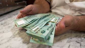 As Lebanese pound loses 90 pct of value, citizens carry ‘worthless’ stacks of cash