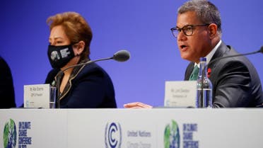 President for COP26, Alok Sharma and Executive Secretary of the United Nations Framework Convention on Climate Change, Patricia Espinosa hold a press conference during the UN Climate Change Conference (COP26) in Glasgow, Scotland, Britain, on October 31, 2021. (Reuters)