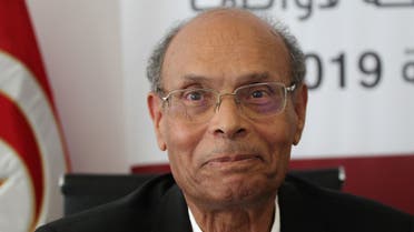 Tunisian former president Moncef Marzouki submits his candidacy for the upcoming early presidential elections in the capital Tunis on August 7, 2019. (AFP)