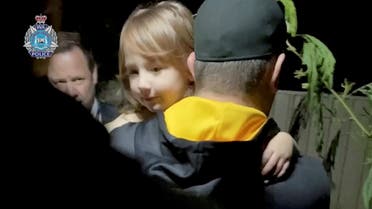 Bodycam footage shows a security officer carrying 4-year-old Cleo Smith, who went missing from an Australian outback campsite more than two weeks ago and was found in a locked house on November 3, as she is being rescued, in Carnarvon, Australia, November 3, 2021. (Reuters)