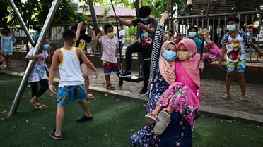 Children play at a public park, as the country's capital region loosens coronavirus disease (COVID-19) restrictions, in Quezon City, Metro Manila, Philippines, November 2, 2021. Picture taken November 2, 2021. (Reuters)