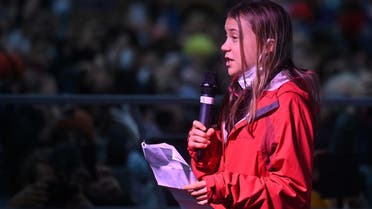 Swedish climate activist Greta Thunberg speaks to the crowd from the stage in George Square in Glasgow on November 5, 2021 on the sidelines of the COP26 UN Climate Summit being held in the city. (AFP)