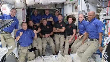 ESA astronaut Thomas Pesquet of France, NASA astronauts Shane Kimbrough and Megan McArthur, and JAXA astronaut Akihiko Hoshide of Japan of Crew 2 assemble with Crew 1 for a welcome ceremony after they arrived aboard the International Space Station, after docking SpaceX's Crew Dragon capsule obiting the earth April 24, 2021 in a still image from video. (Reuters via NASA TV)