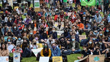 Students and protesters take part in a climate change protest in Adelaide, Australia, on October 15, 2021. (Reuters)             