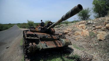 A tank damaged during the fighting between Ethiopia's National Defense Force (ENDF) and Tigray Special Force stands on the outskirts of Humera town in Ethiopia July 1, 2021. (Reuters)