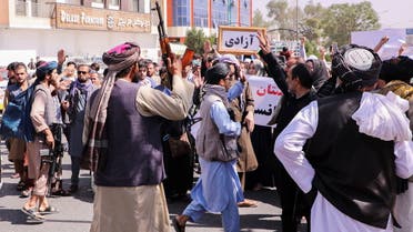 Taliban forces try to stop the protesters, as they shout slogans during an anti-Pakistan protest, near the Pakistan embassy in Kabul, Afghanistan, Sept. 7, 2021. (Reuters)
