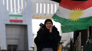 An Iranian Kurdish woman arrives at the Iran-Iraq border crossing of Haji Omran on January 3, 2018, one day after two border posts were reopened between Iraqi Kurdistan and the Islamic republic. The borders had been closed in response to an independence vote rejected by Baghdad and neighbouring countries last year.
