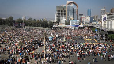 People gather at a rally organized by local authorities to show support for the Ethiopian National Defense Force (ENDF), at Meskel square in downtown Addis Ababa, Ethiopia on Nov. 7, 2021. (AP)