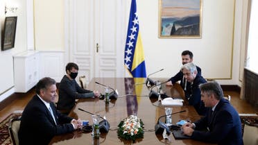 US Deputy Assistant Secretary of State Gabriel Escobar, left, speaks with Croat member of the tripartite Presidency of Bosnia Zeljko Komsic, right, in the capital Sarajevo, Nov. 8, 2021. (AP)