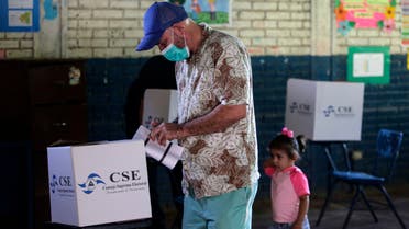 A man casts his vote during general election, at a polling station in Managua on November 7, 2021. (AFP)