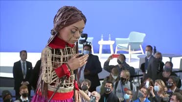 Three-metre tall puppet of a Syrian refugee girl, known as ‘Little Amal’ at UN COP26 climate summit. (Reuters)
