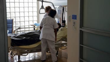 File photo of nurses providing care to a patient at the palliative care unit of the AP-HP Paul-Brousse Hospital in Villejuif near Paris March 4, 2015. (Reuters)