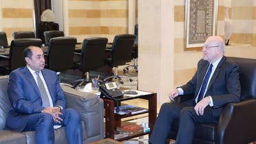 Arab League Assistant Secretary-General Hossam Zaki meets with Lebanon’s PM Najib Mikati in Beirut, Nov. 8, 2021. (Reuters)