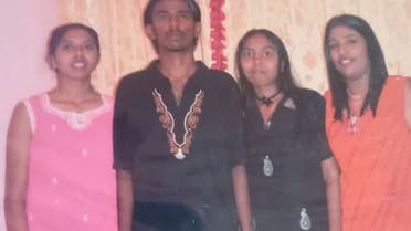 Undated handout photo shows Nagaenthran Dharmalingam (2nd L) with his sister Sarmila (R) and his cousins in Malaysia. Nagaenthran Dharmalingam, 33, is scheduled to be hanged on November 10, but the court stayed his execution pending an appeal to be heard on November 9. (Reuters)