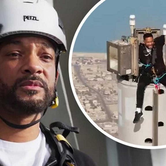 شاهد ويل سميث يتسلق أعلى مبنى بالعالم ويجلس على قمته