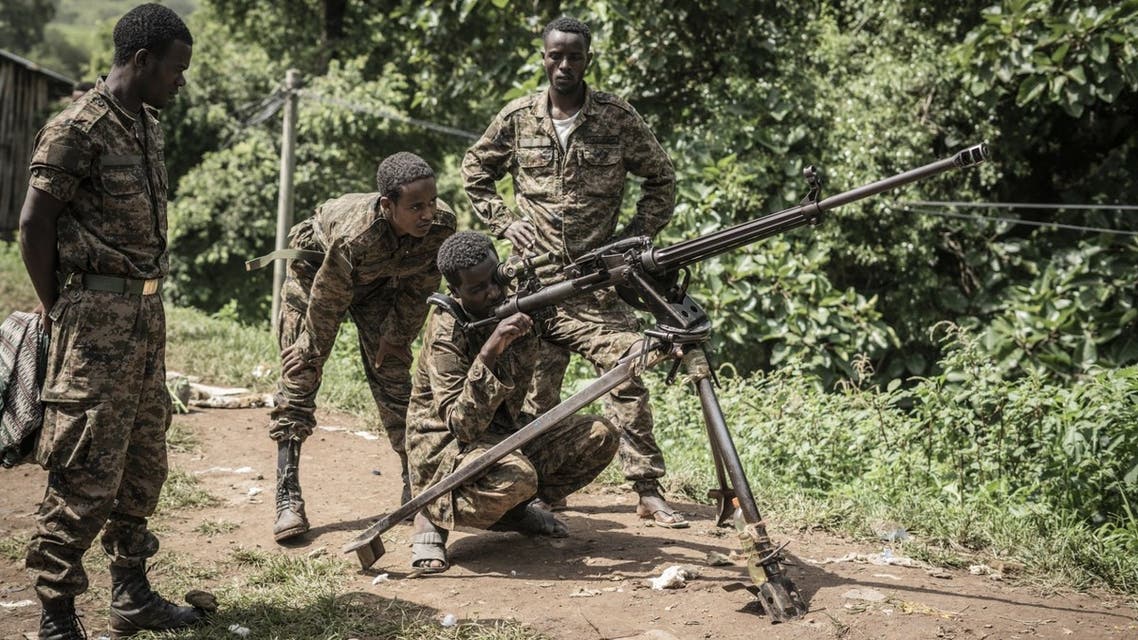 Ethiopian National Defence Force (ENDF) soldiers train with a DShK 1938, a Soviet heavy machine gun, in their camp at an undisclosed location in Ethiopia, on September 16, 2021. (AFP)