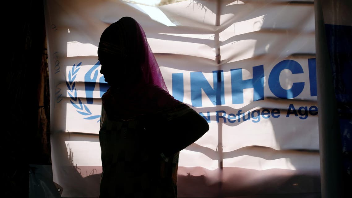 An Ethiopian refugee stands as she is registered by the United Nations High Commissioner for Refugees (UNHCR) at the Um Rakuba refugee camp which houses Ethiopian refugees fleeing the fighting in the Tigray region, on the Sudan-Ethiopia border, Sudan, November 28, 2020. (Reuters)