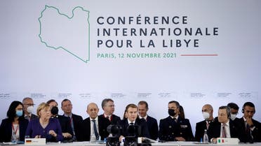 French President Emmanuel Macron, German Chancellor Angela Merkel and Italian PM Mario Draghi at the International Conference on Libya in Paris, Nov. 12, 2021. (Reuters)