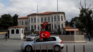 Supporters of Turkish President Tayyip Erdogan drive past his residence in Istanbul, Turkey June 24, 2018. REUTERS/Alkis Konstantinidis