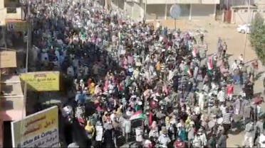 Demonstrators march in Khartoum, Sudan November 13, 2021, in this screen grab obtained from a video. (RASD SUDAN NETWORK via Reuters)
