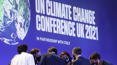 Delegates talk during the UN Climate Change Conference (COP26) in Glasgow, Scotland, Britain November 13, 2021. (Reuters)