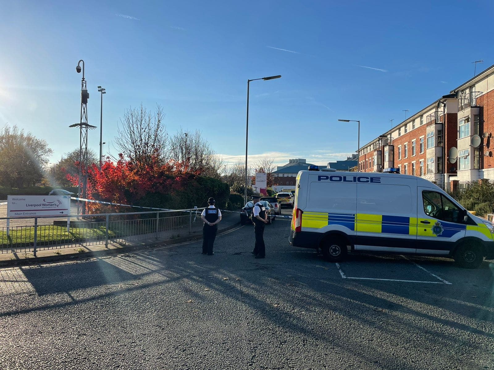 Police at the site of the explosion of a 'auto in Liverpool