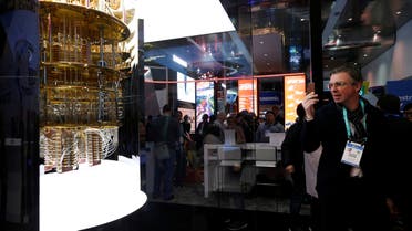 A man takes a photo of a model of the IBM Q System One quantum computer during the 2020 CES in Las Vegas, Nevada, US January 7, 2020. (Reuters)