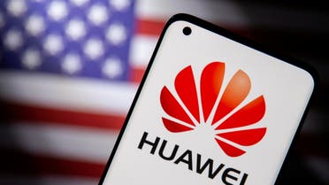 Smartphone with a Huawei logo is seen in front of a U.S. flag in this illustration taken September 28, 2021. (File Photo: Reuters)