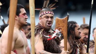 Maori men perform a haka as the casket of late New Zealand All Blacks rugby legend Jonah Lomu is carried onto Eden Park during a memorial service in Auckland on November 30, 2015. (AFP)