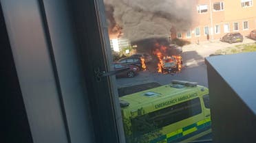 A car burns outside Liverpool Women's hospital in Liverpool, Britain November 14, 2021. Picture taken November 14, 2021. (Courtesy of Carl Bessant/via Reuters)
