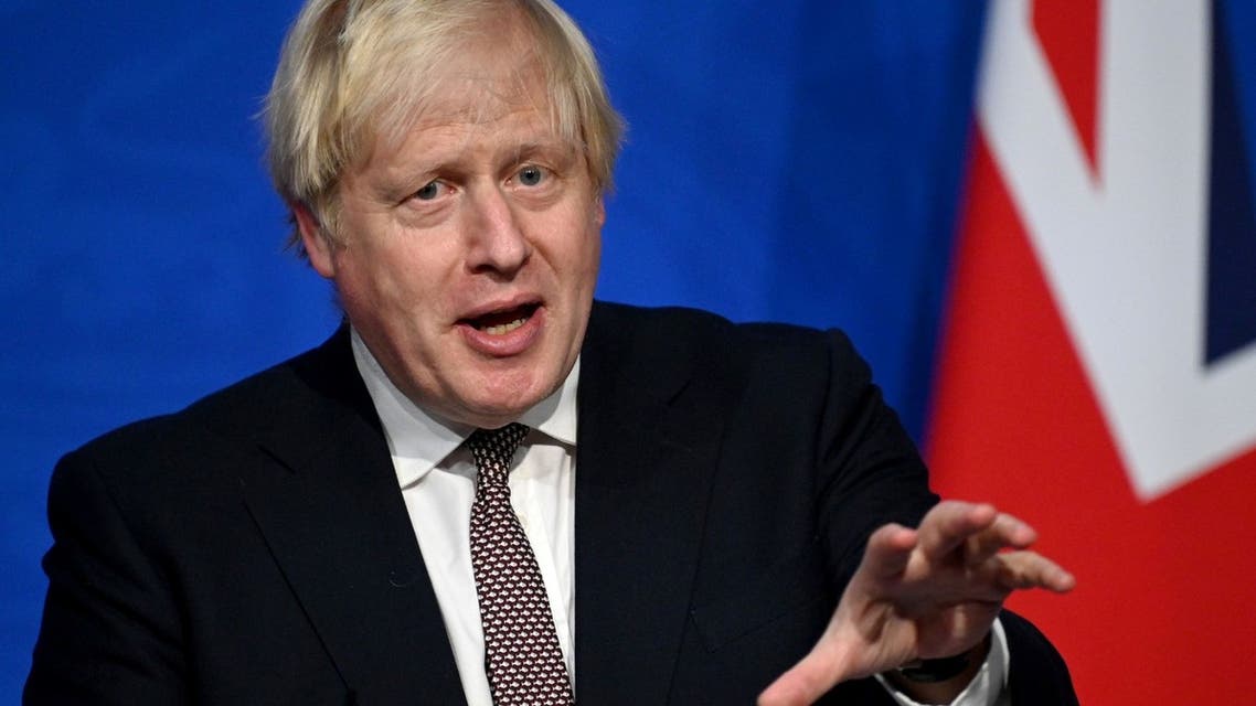 Britain's Prime Minister Boris Johnson attends a media briefing on the latest Covid-19 update in the Downing Street briefing room, central London on November 15, 2021. (AFP)