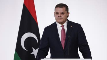Libyan Prime Minister Abdul Hamid Dbeibah takes part in a press conference at the end of the International Conference on Libya at La Maison de la Chimie in Paris on November 12, 2021. (AFP)