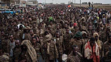 In this file photo taken on July 02, 2021 Captive Ethiopian soldiers walk towards the Mekele Rehabilitation Center in Mekele, the capital of Tigray region, Ethiopia. (AFP)