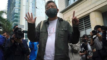 File photo of pro-democracy activist Lee Cheuk-yan, gesturing before his sentencing at a court in Hong Kong on April 16, 2021.  (AP)