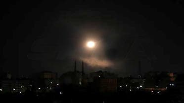 A handout picture released by the official Syrian Arab News Agency (SANA) on August 20, 2021 shows a light spot over the capital Damascus late on August 19, 2021. (AFP)