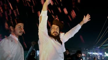 Saad Rizvi, head of the radical party Tehreek-e-Labiak Pakistan, waves to supporters following his release from custody, in Lahore, Pakistan, Nov. 18, 2021. (AP/K.M. Chaudary)