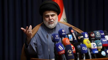 Iraqi Shia cleric Muqtada al-Sadr speaks during a news conference in Najaf, Iraq, November 18, 2021. (Reuters/Alaa Al-Marjani)