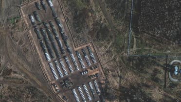  In this file handout satellite image released by Maxar Technologies taken on November 1, 2021 shows Russian tanks, armoured personnel carriers and support equipment amid the presence of a large ground forces deployment on the northern edge of the town of Yelnya, Smolensk Oblast, Russia. (AFP)