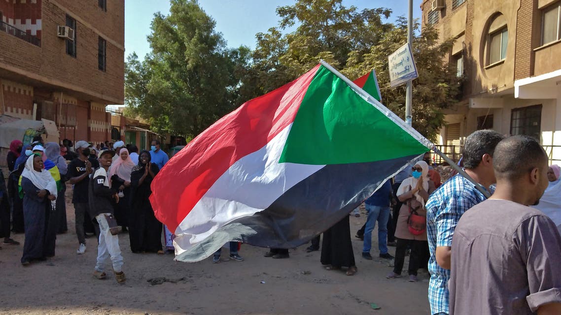 Sudanese anti-coup protesters gather amid ongoing protests against last month's widely condemned military takeover, in the Street 40 of the capital's twin city of Umdurman on November 17, 2021. Thousands took to the streets in Khartoum and other cities but were met by the deadliest crackdown since the coup. (Photo by AFP)