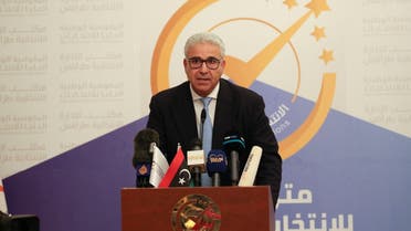 Fathi Bashagha, former Interior Minister, delivers a speech after submitting his candidacy papers for the upcoming presidential election at the Headquarters of the Electoral Commission in Tripoli, Libya, November 18, 2021. (Reuters/Hazem Ahmed)