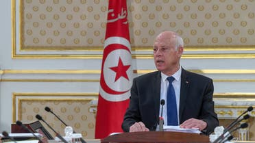 A handout picture provided by the Tunisian Presidency's official Facebook Page on October 14, 2021 shows President Kais Saied chairing the first meeting of a new cabinet in Tunis following his July power grab. (Photo by Tunisian Presidency / AFP) / === RESTRICTED TO EDITORIAL USE - MANDATORY CREDIT AFP PHOTO / HO / PRESIDENCY PRESS SERVICE  - NO MARKETING NO ADVERTISING CAMPAIGNS - DISTRIBUTED AS A SERVICE TO CLIENTS === - === RESTRICTED TO EDITORIAL USE - MANDATORY CREDIT AFP PHOTO / HO / PRESIDENCY PRESS SERVICE  - NO MARKETING NO ADVERTISING CAMPAIGNS - DISTRIBUTED AS A SERVICE TO CLIENTS ===